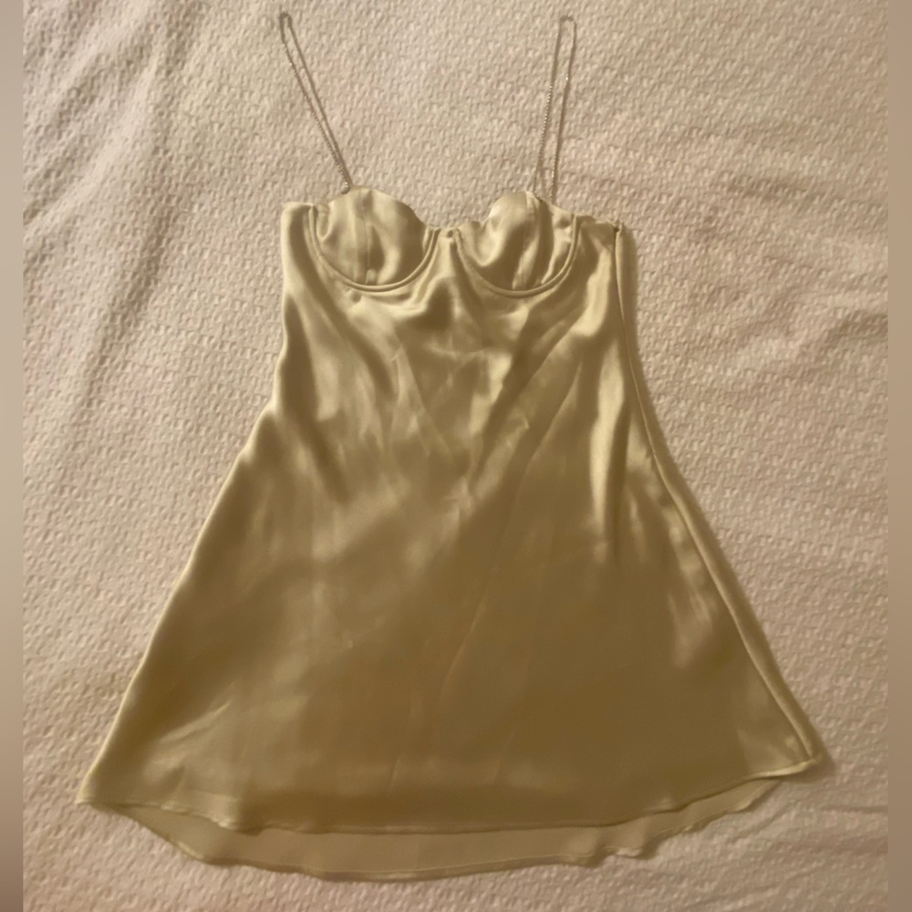 Sage green mini babydoll dress.